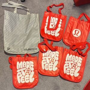 set of lululemon athletica Red 'Made to Feel' Graphic Tote Bag
